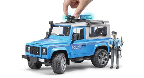 Bruder 02597 Land Rover Defender Station Wagon Police vehicle with Fig