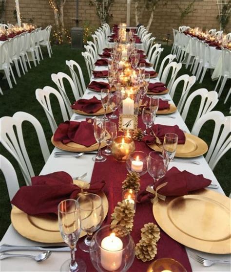 Burgundy, beige and gold table setup Gold wedding decorations