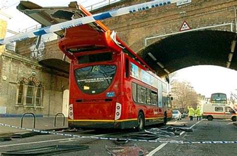 bus hits bridge today