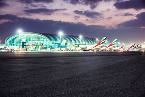 business flights to dwc airport