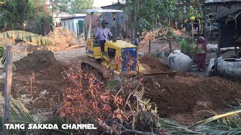 cambodia dozers leveling streets