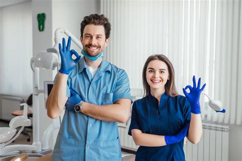 Dentist talking to patient about dental care Wharton Dental Blog