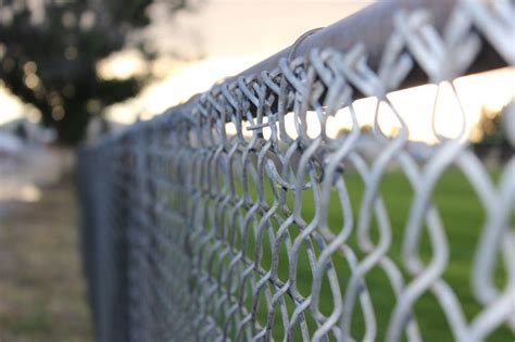 can you make chain link fence taller