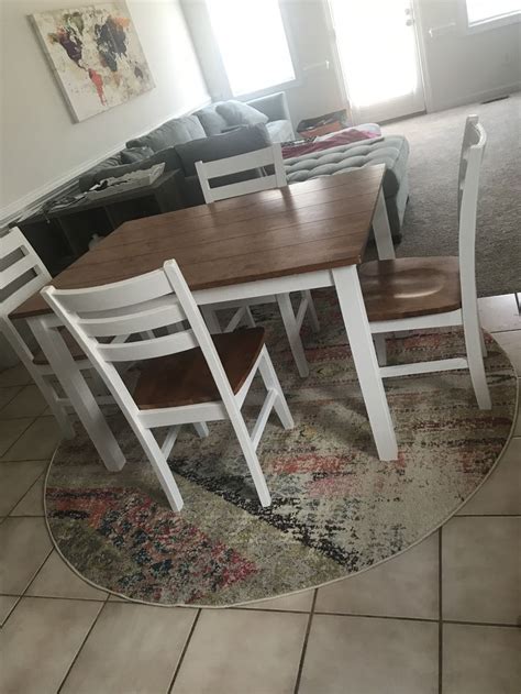 Can You Use A Rectangular Rug Under A Round Table