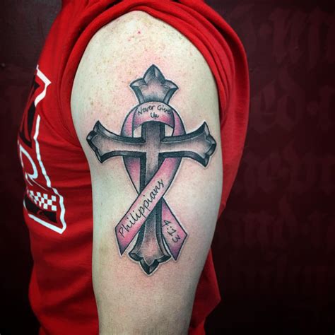 cancer ribbon with cross tattoo