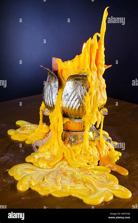 Candle Wax Dripping On The Table Is An Example Of