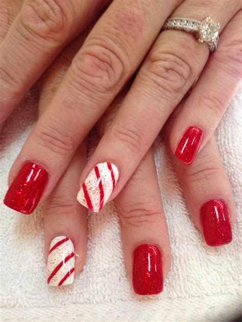 Red and White Candy Cane Nails easy winter and christmas nails
