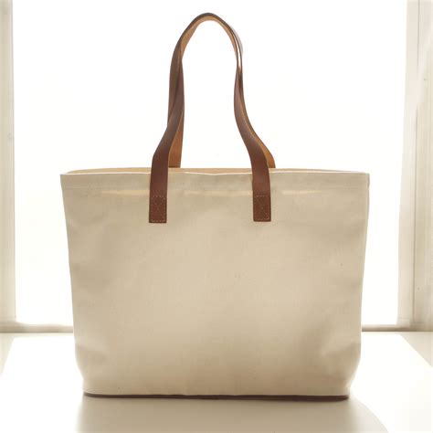 home.furnitureanddecorny.com:canvas tote bag with leather handles