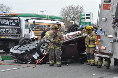 car hits tow truck and flips