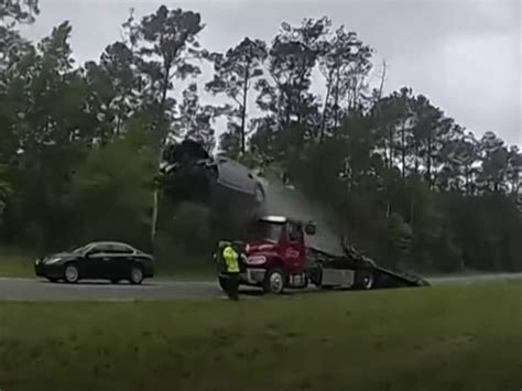 car jumps tow truck ramp