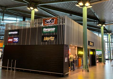 car rental schiphol airport amstel station