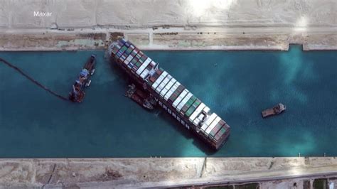 cargo ship stuck in suez canal path