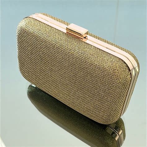 Cartera de fiesta dorada La Festa