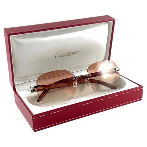 cartier rimless sunglasses with c decor