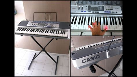 CASIO LK100 Key Lighting System 61 Keys Electronic Keyboard with Stand