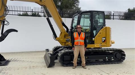 Cat 309 Vs 310