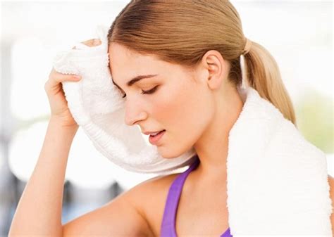 causes of excessive head sweating in women