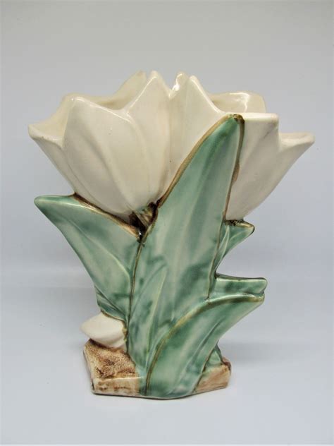ceramic vase with tulip cutouts by jwl