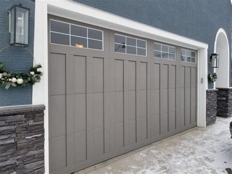 chamberlain garage door opening by itself