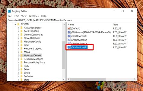 How to Assign / Change Drive Letter in Windows 10 WinBuzzer