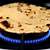char tortillas on electric stove