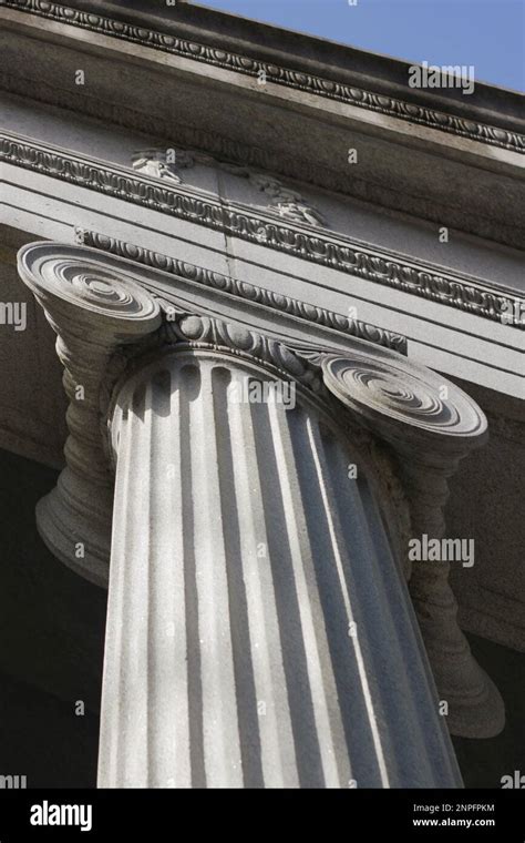 Characterized By Fluted Columns And Capitals With Scroll-Like Ornaments