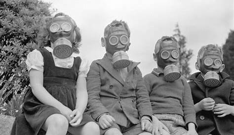 Children in Liverpool wearing gas masks and protective clothing during