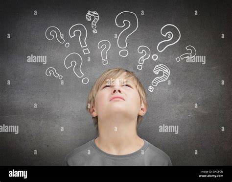 Child looking at a question mark