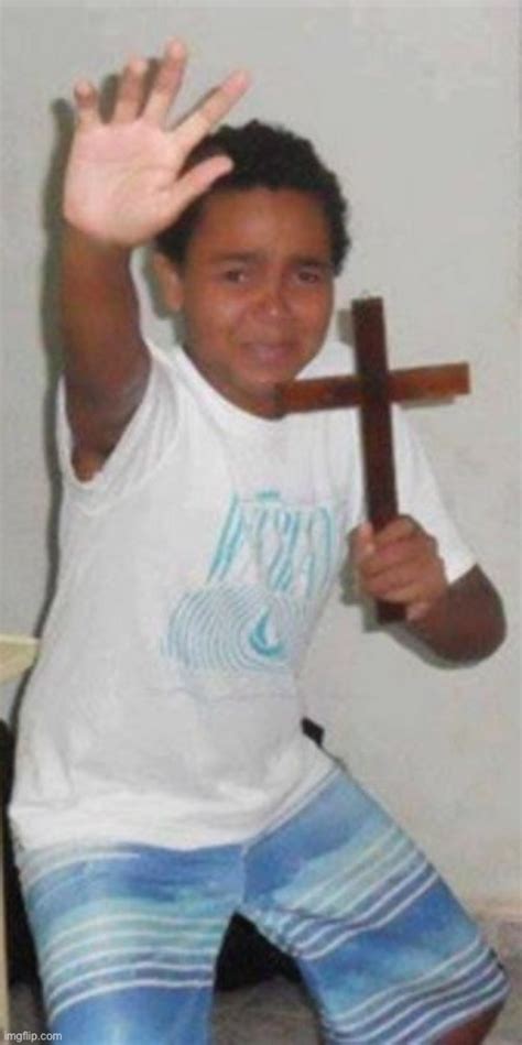 child with cross meme