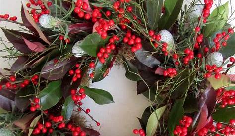 Christmas Wreath Pinterest A With Red Berries And Greenery Hanging On A