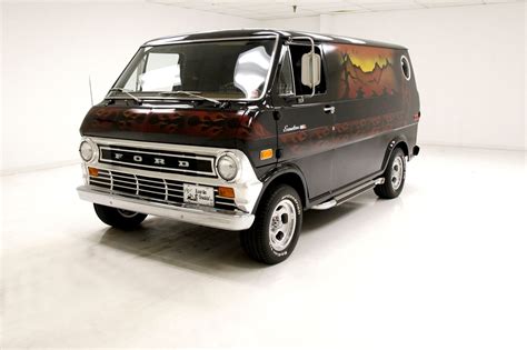 A vintage Ford Econoline van, showcasing another facet of Ford truck models old