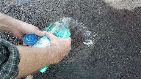 clean oil from tarmac drive