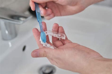 cleaning Invisalign aligners