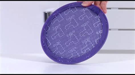 cleaning a dyson filter dc23