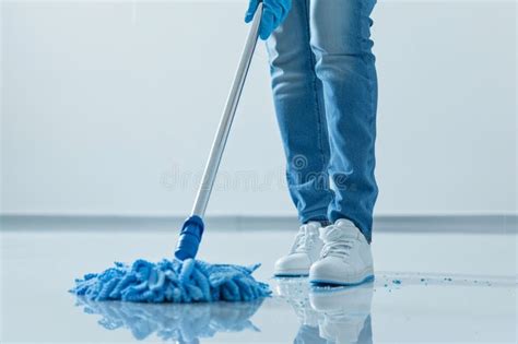 Cleaning A Floor Using A Lot Of Effort