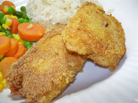 Coating Fish with Cornmeal for Fried Fish Recipe Cornmeal