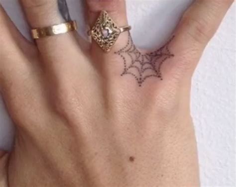 Cobweb Finger Tattoo