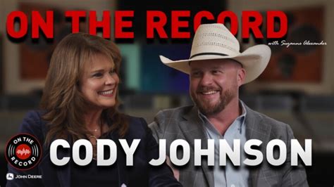 Cody Johnson performing with a band