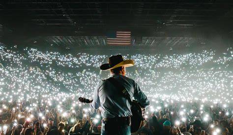 Cody Johnson performing in a concert