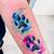colorful paw print tattoo