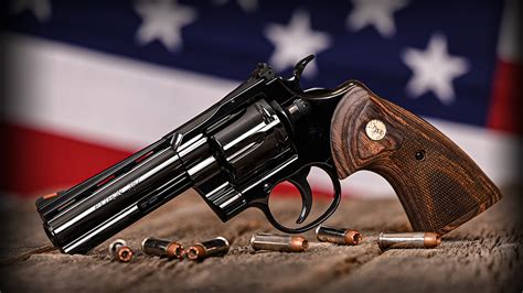 Colt Python .357 Magnum 6 Shot Revolver Fiber Optic Sights Stainless Walnut 4.25" PYTHON