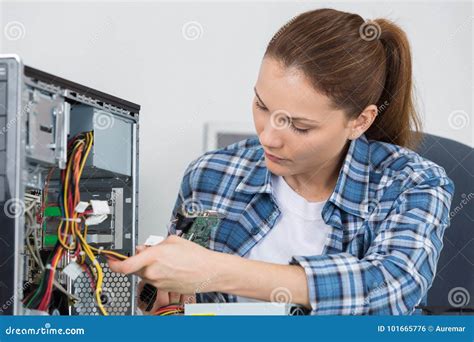 computer technician fixing a computer