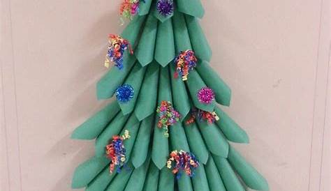 Christmas tree with construction paper strips, and a bird