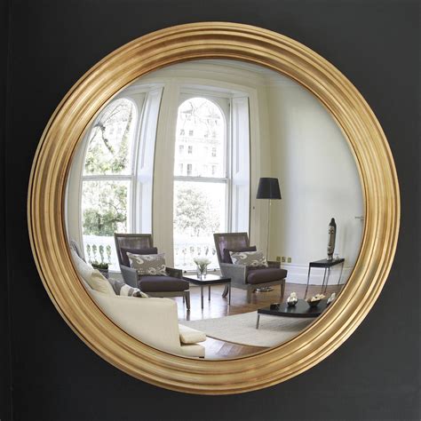 CONVEX WALL MIRROR, Regency giltwood circular with convex plate