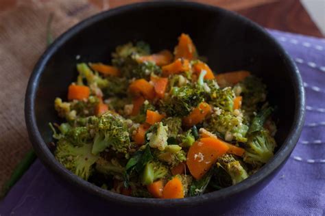 A piping hot serving of broccoli poriyal, adorned with vibrant cilantro, ready to delight the senses.