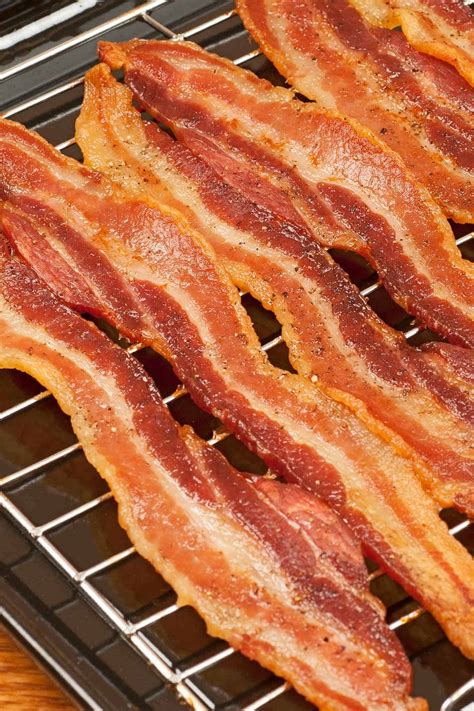cooking strips of bacon
