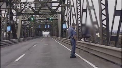 cop saves man from jumping off bridge