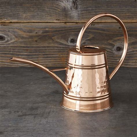 copper watering can