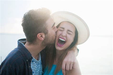 Couple laughing at beach