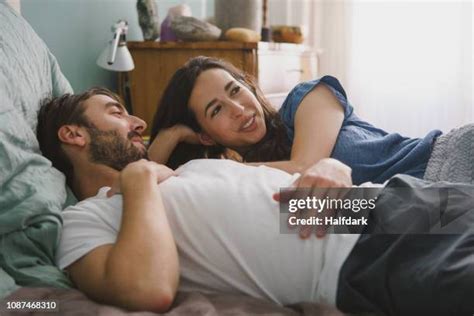 Couple Talking in Bed